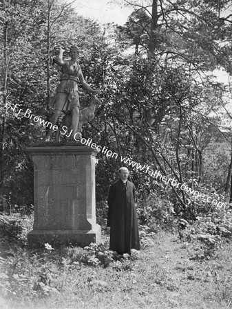 REV T COUNIHAN S.J. AT STATUE IN ST MARY'S EMO